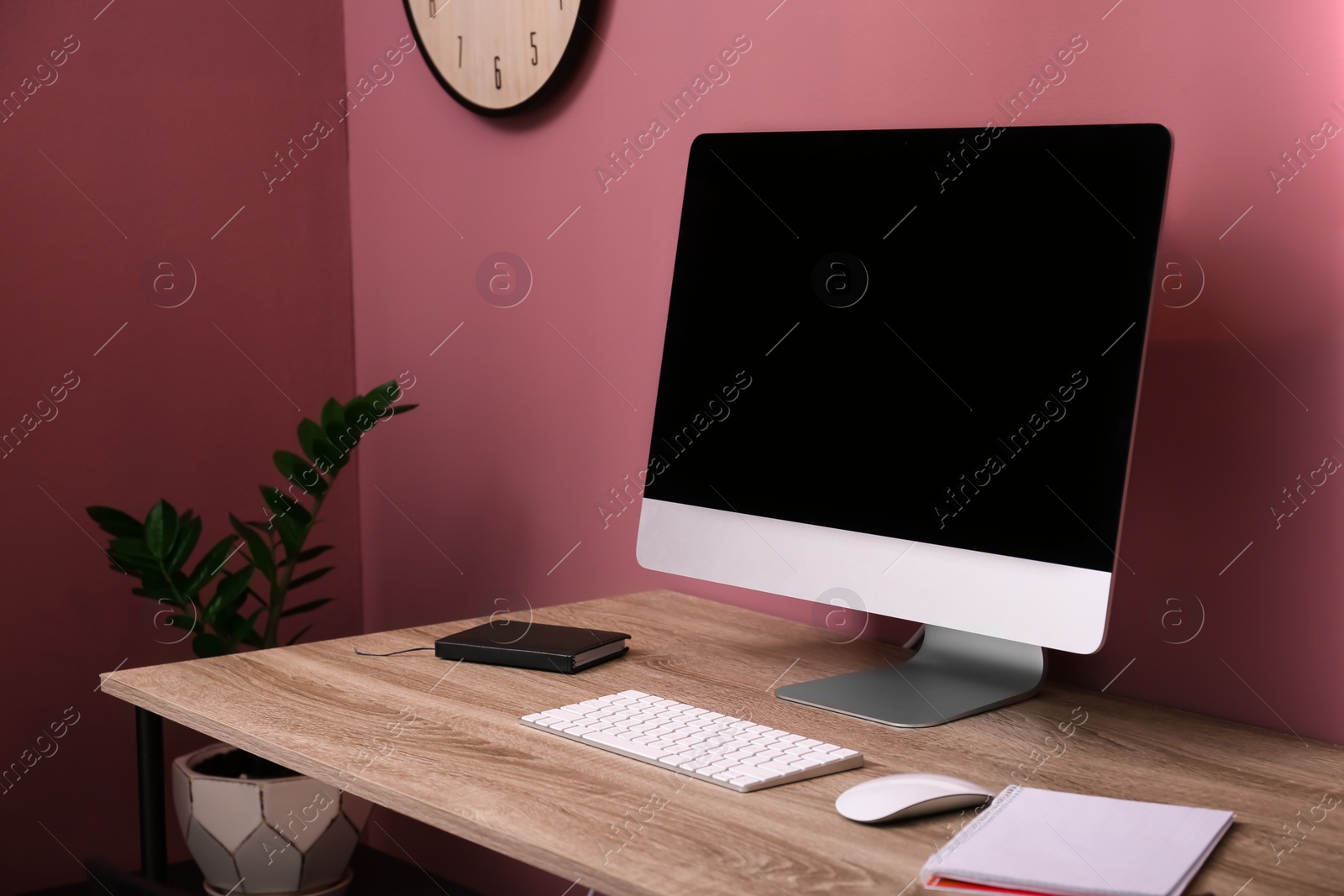 Photo of Comfortable workplace with computer on desk in home office