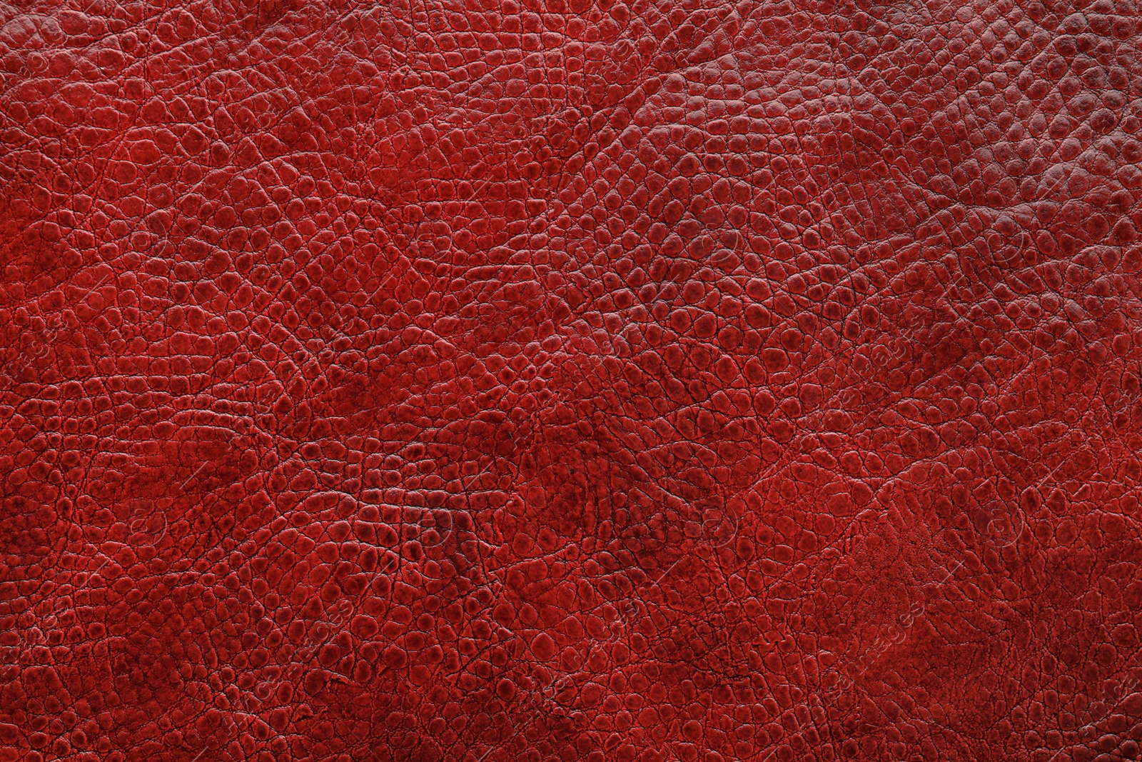 Photo of Texture of brown leather as background, closeup