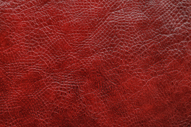 Photo of Texture of brown leather as background, closeup