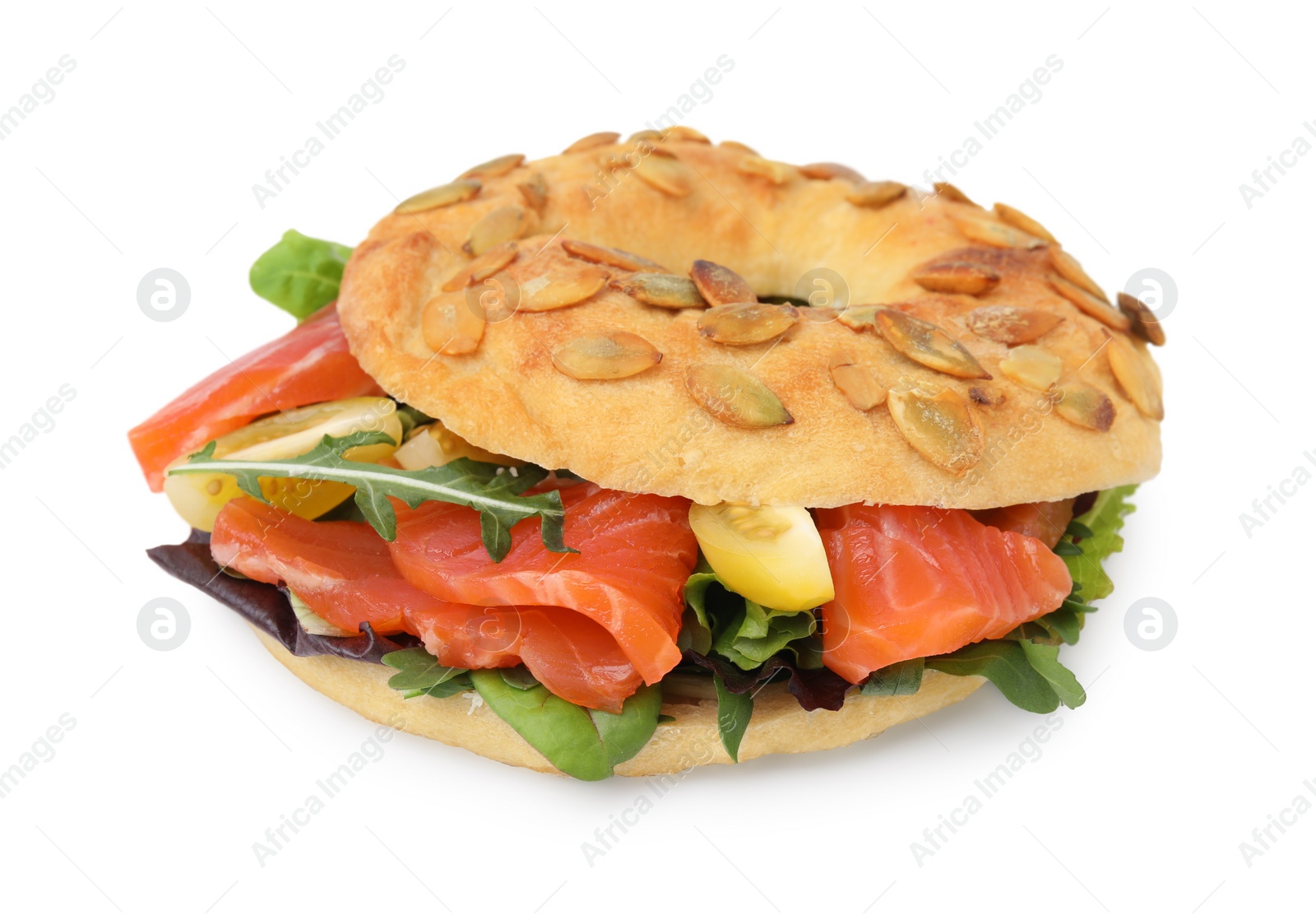 Photo of Tasty bagel with salmon and tomatoes isolated on white