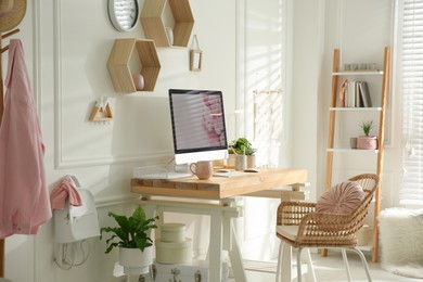 Stylish home office interior with comfortable workplace