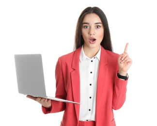 Portrait of young woman in office wear with laptop on white background