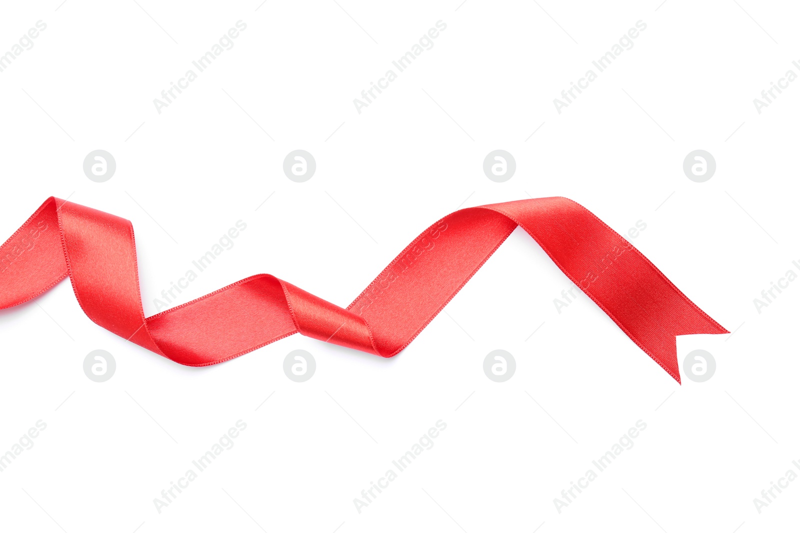 Photo of Simple red ribbon on white background, top view