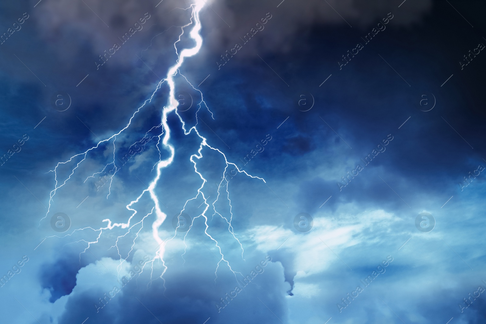 Image of Lightning in dark cloudy sky during thunderstorm