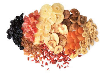 Pile of different tasty dried fruits on white background, top view