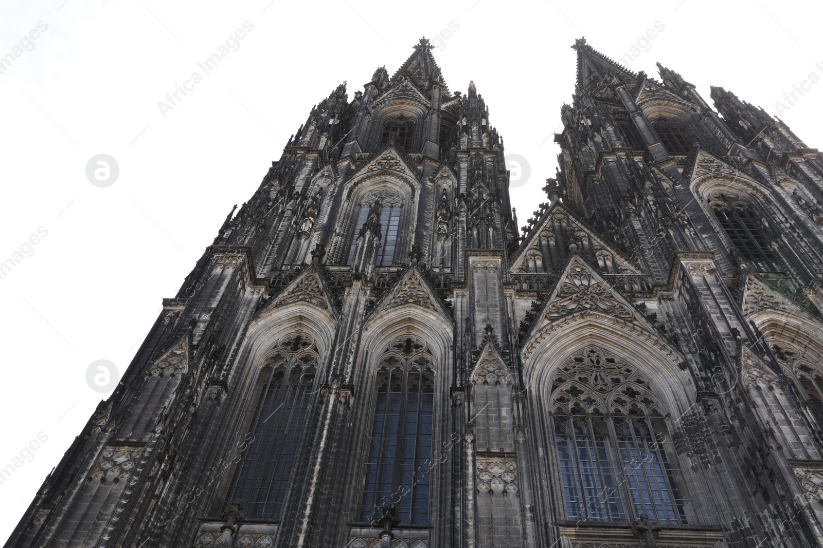 Photo of Cologne, Germany - August 28, 2022: Beautiful old gothic cathedral against blue sky