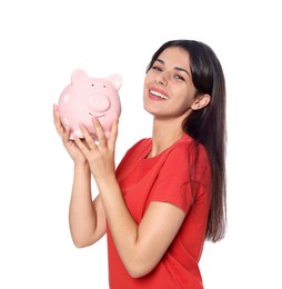 Photo of Happy young woman with piggy bank on white background