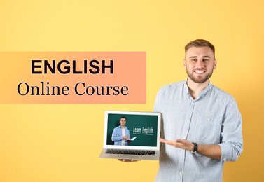 Young man with laptop on yellow background. Online English course