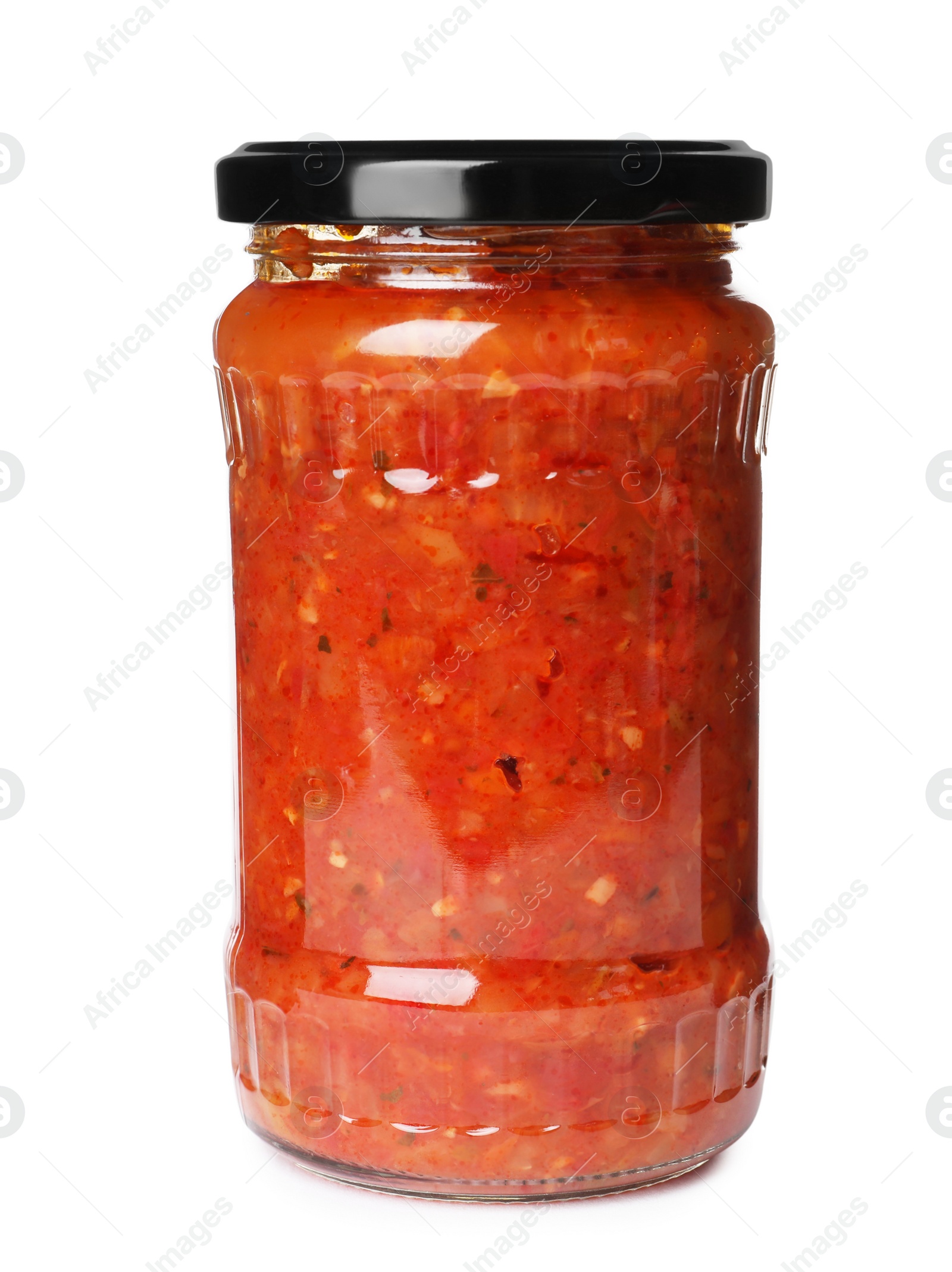 Photo of Glass jar with pickled red sauce isolated on white