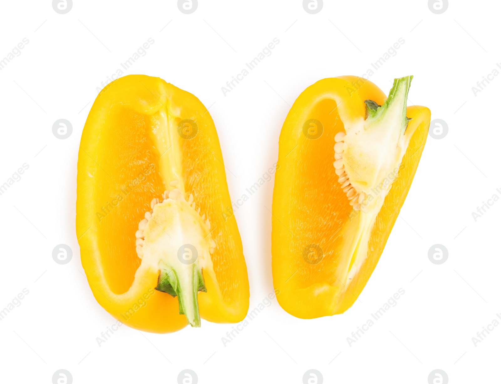 Photo of Cut yellow bell pepper with seeds isolated on white, top view