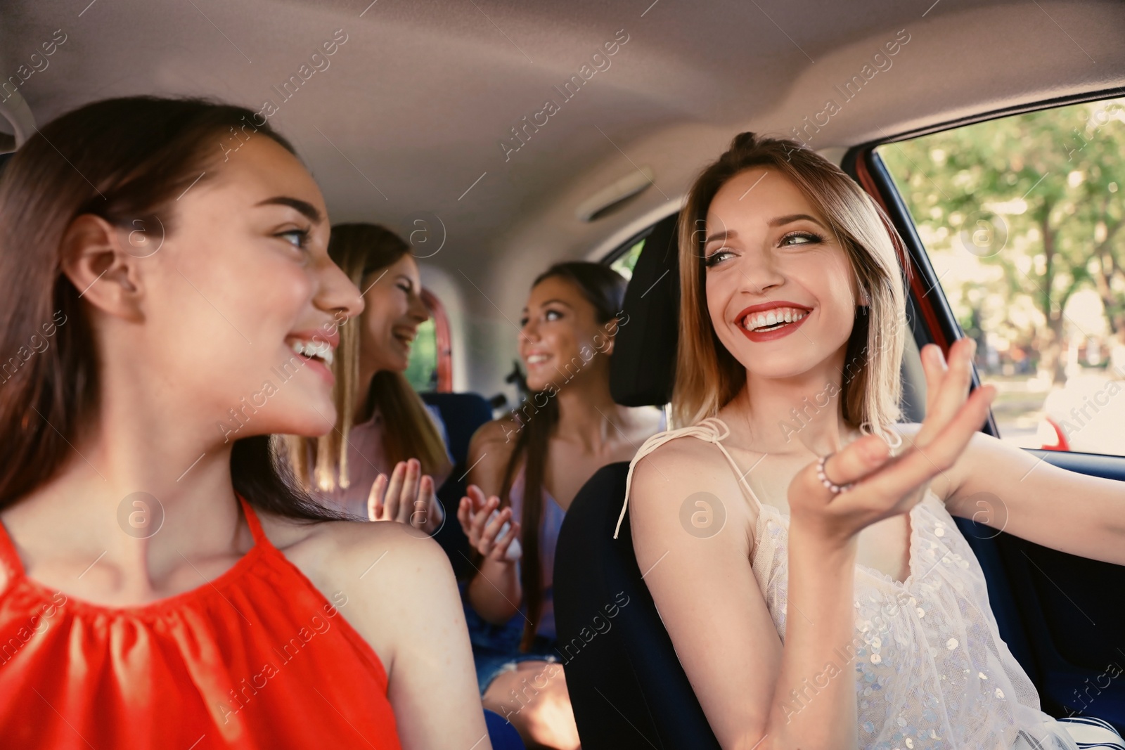 Photo of Happy beautiful young women together in car