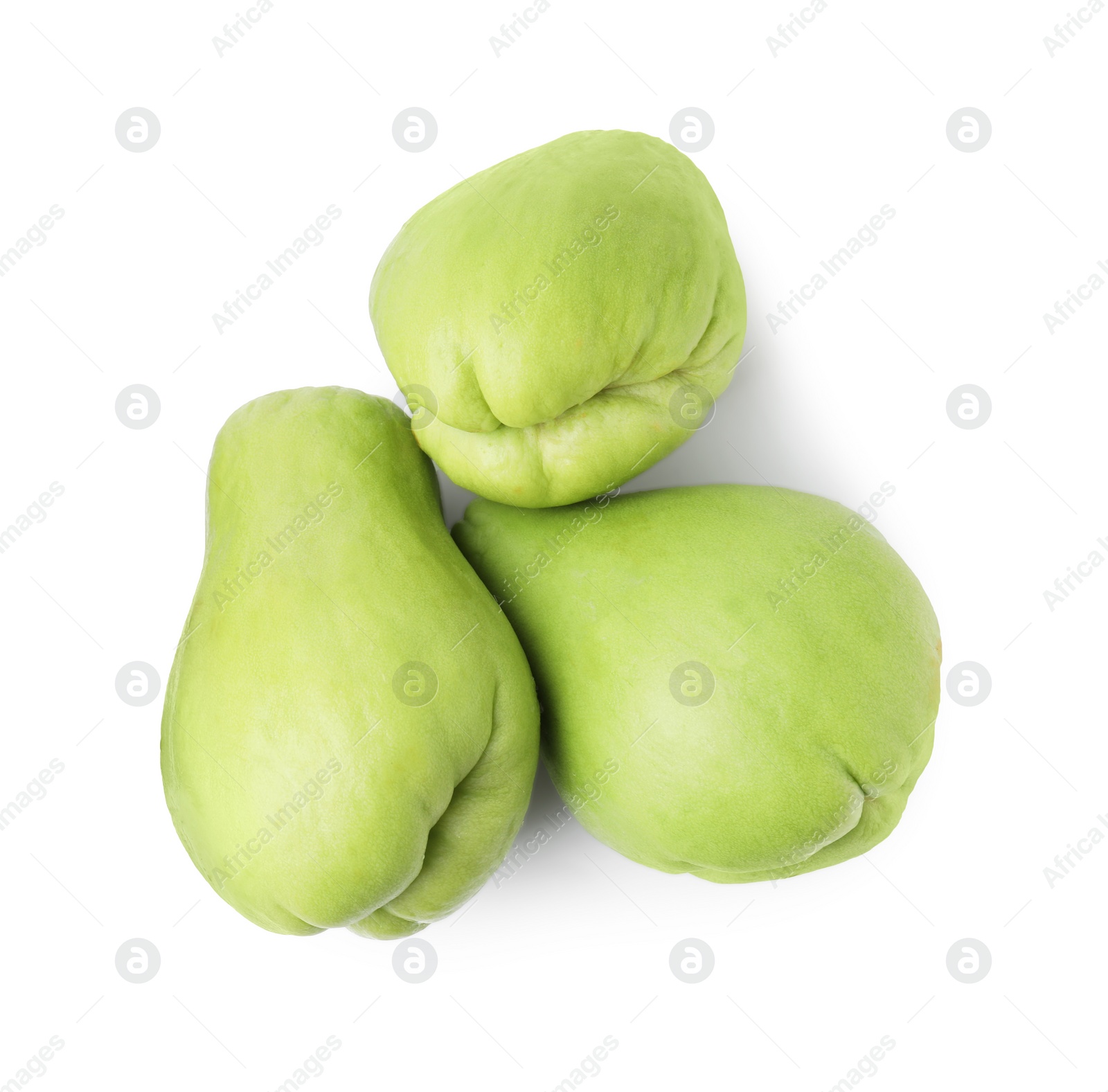 Photo of Many fresh green chayote isolated on white, top view