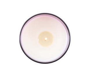 Photo of Burning wax candle in holder isolated on white, top view
