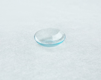 Photo of Contact lens on light background