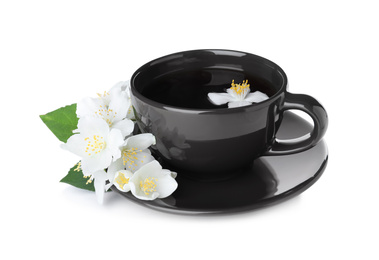 Photo of Cup of tea and fresh jasmine flowers isolated on white