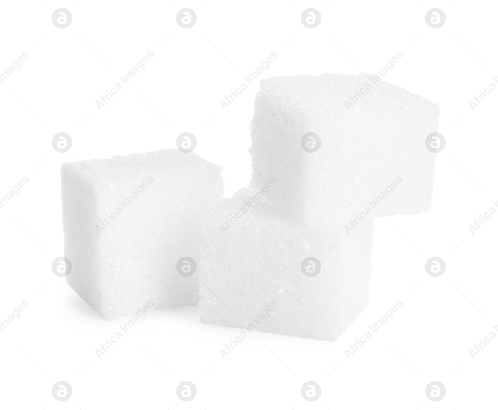 Photo of Three refined sugar cubes isolated on white