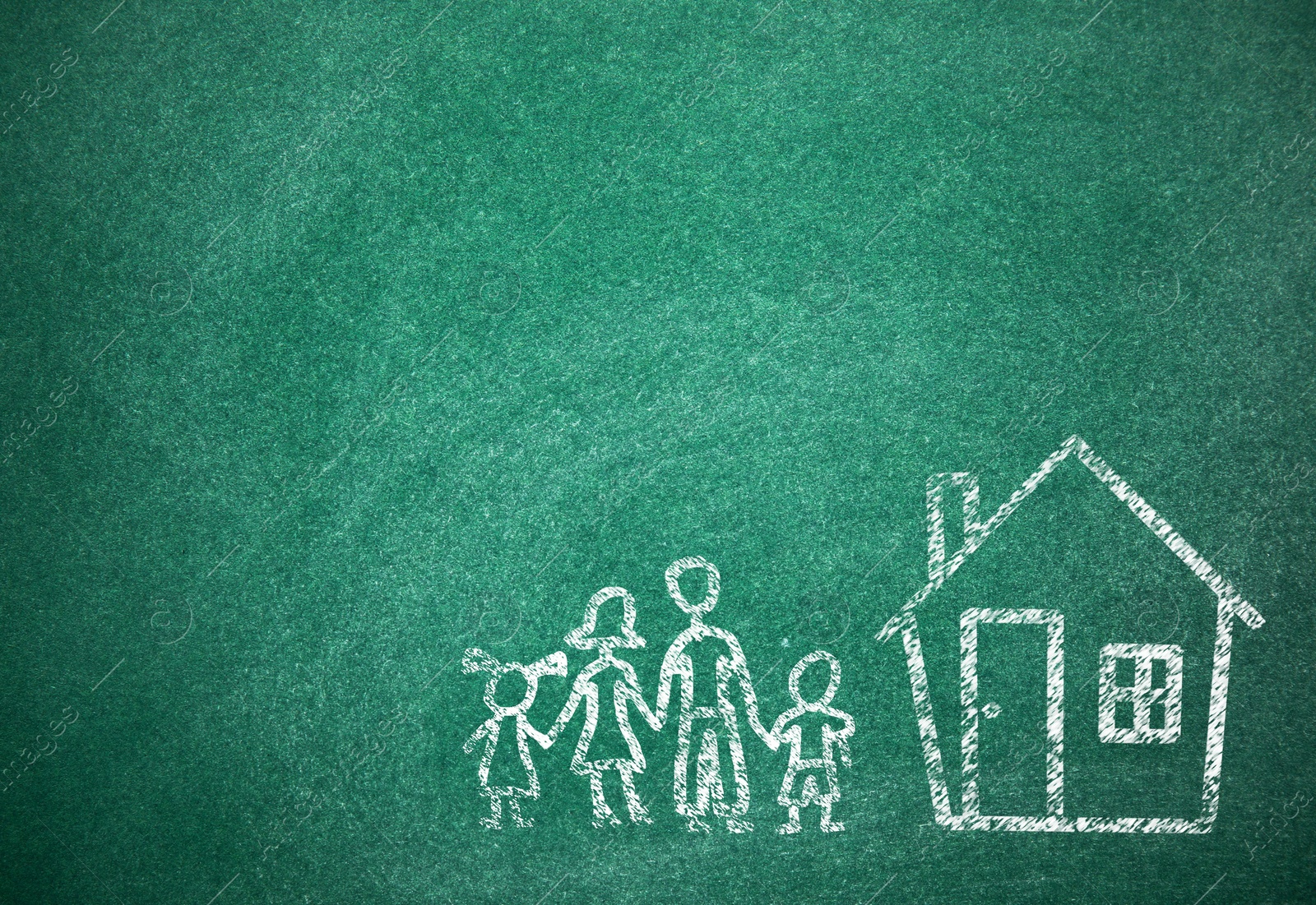 Image of House and family drawn with chalk on school board