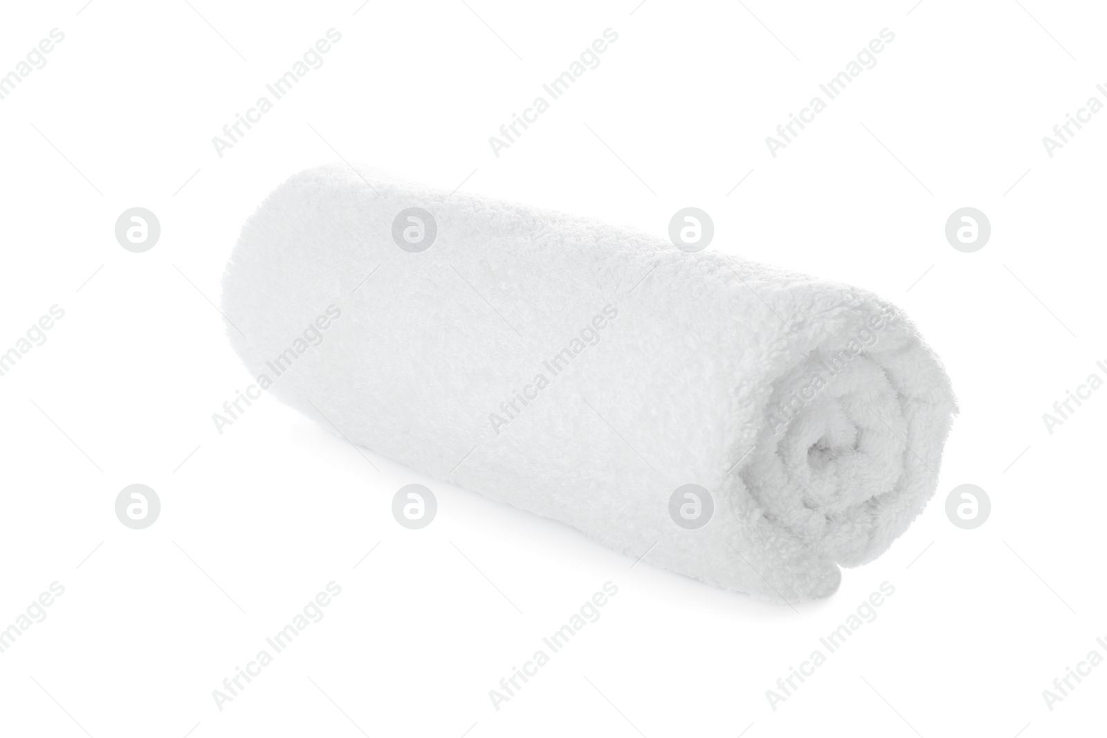 Photo of Rolled soft terry towel on white background