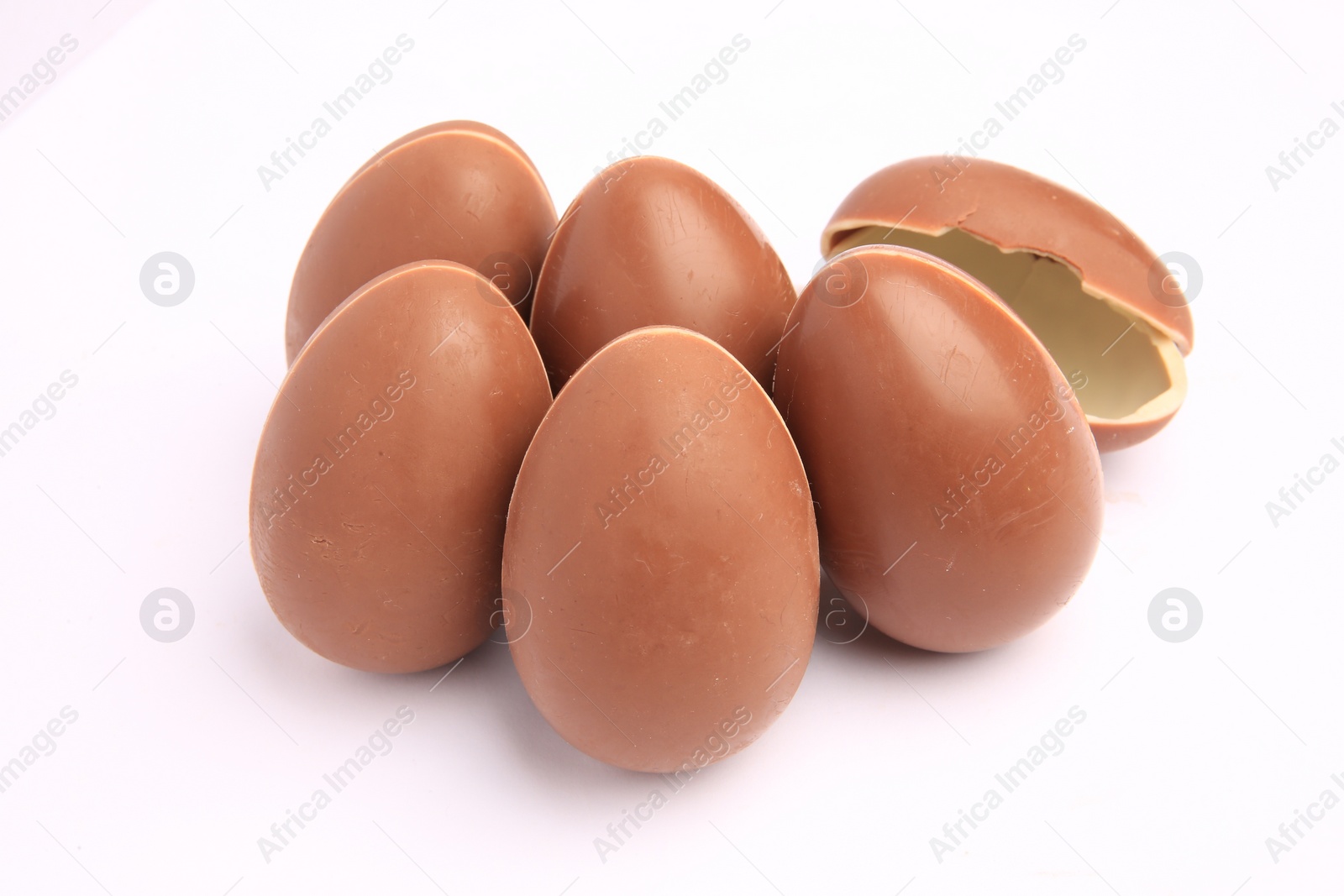 Photo of Sveti Vlas, Bulgaria - June 27, 2023: Unwrapped Kinder Surprise Eggs isolated on white