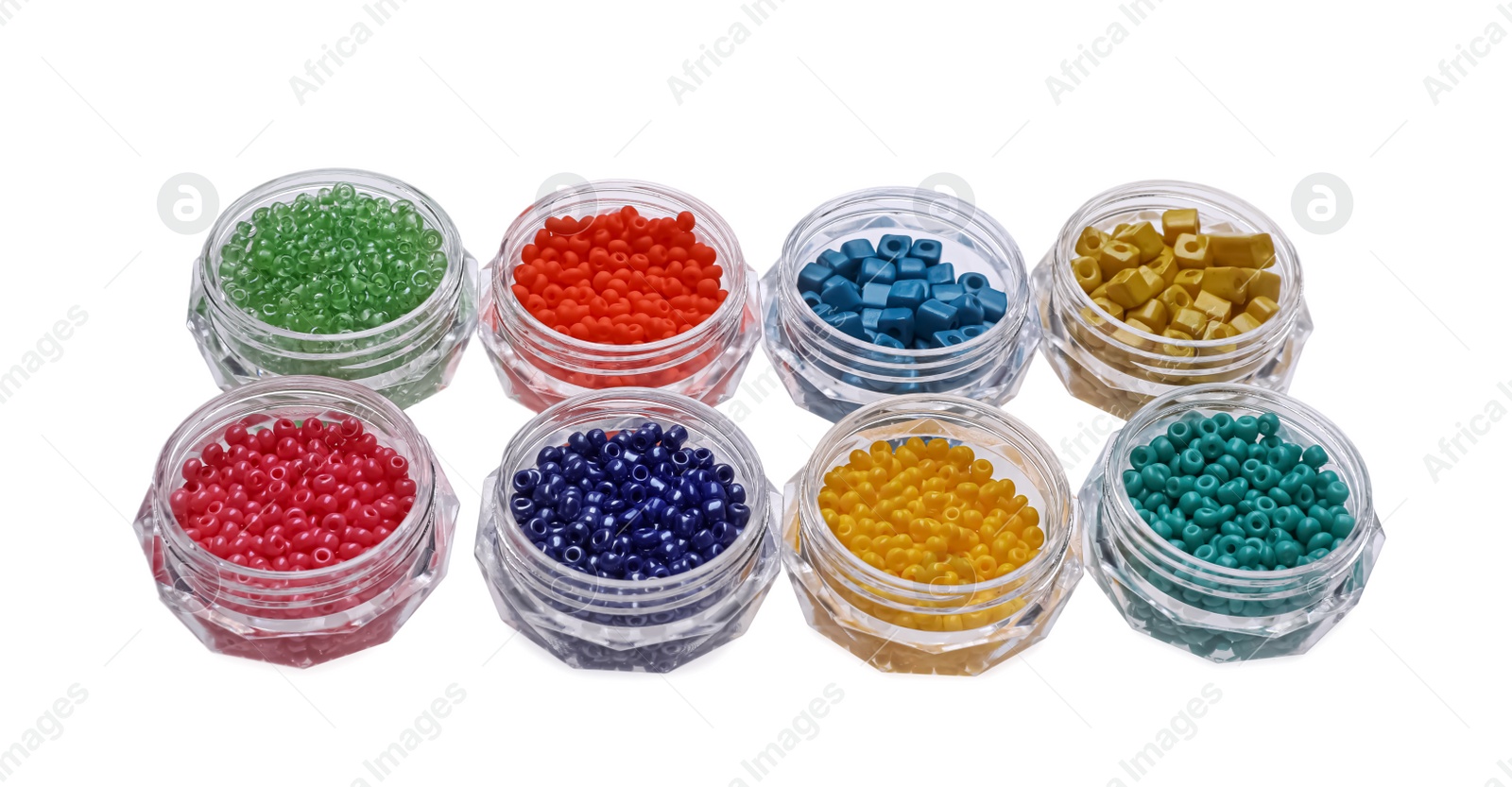 Photo of Plastic containers with different beads on white background