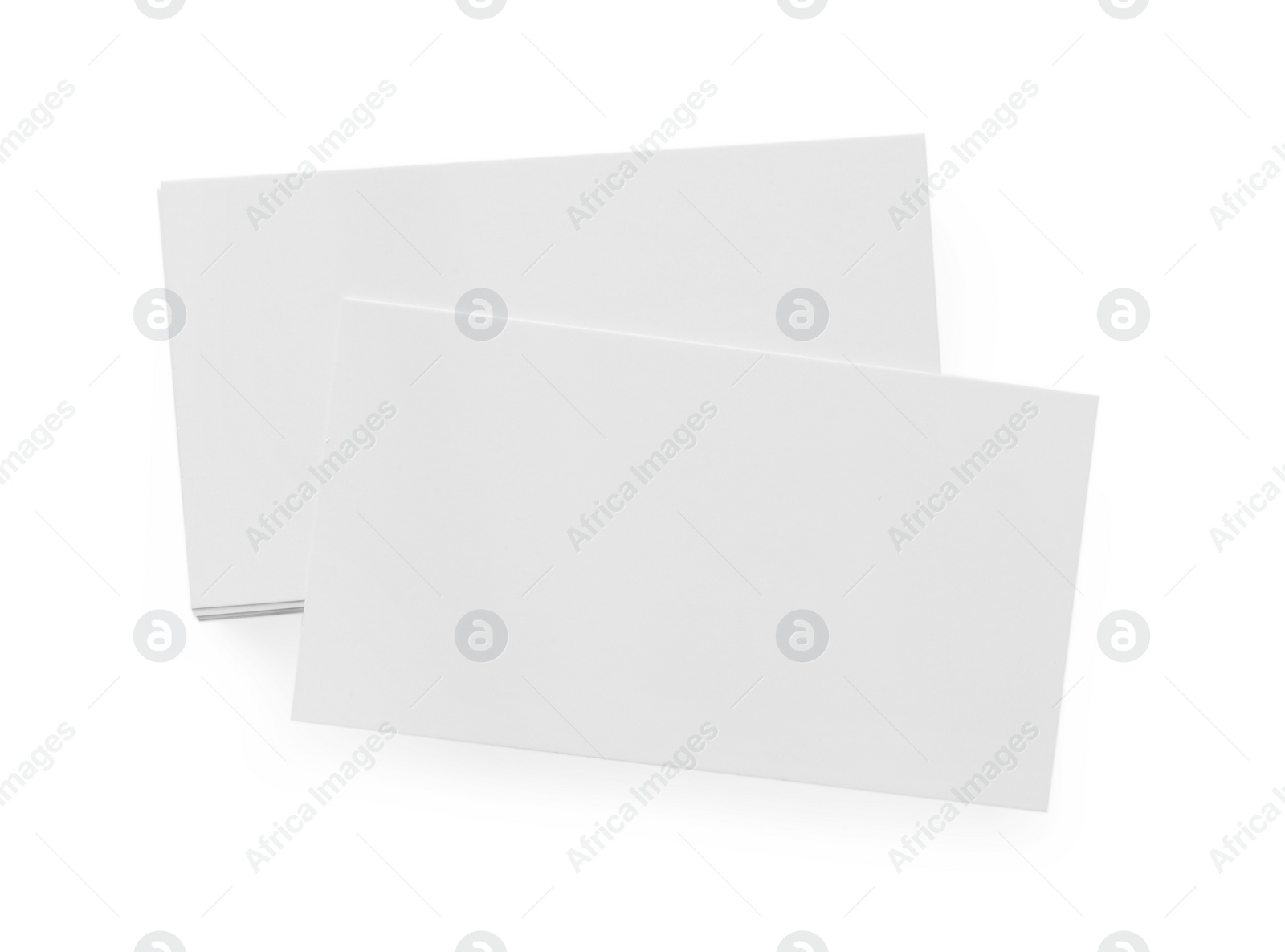 Photo of Blank business cards isolated on white, top view. Mockup for design