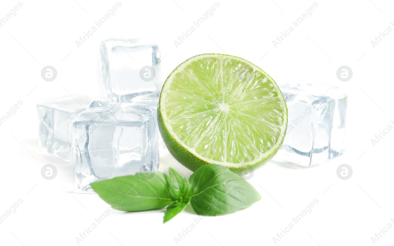 Photo of Half of fresh ripe lime and ice cubes on white background
