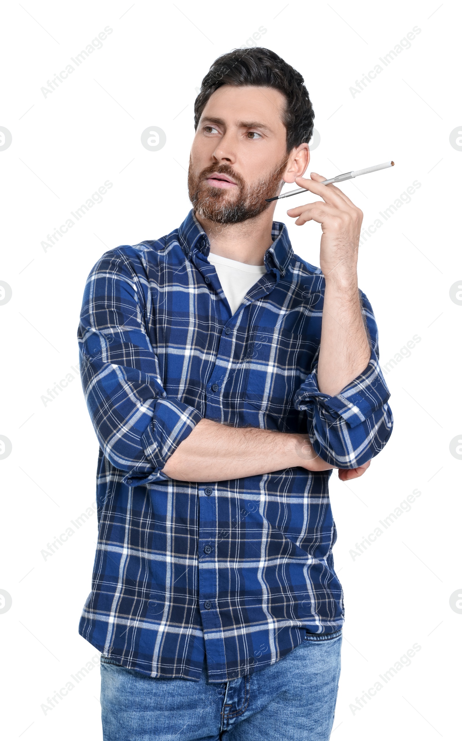 Photo of Man using long cigarette holder for smoking isolated on white