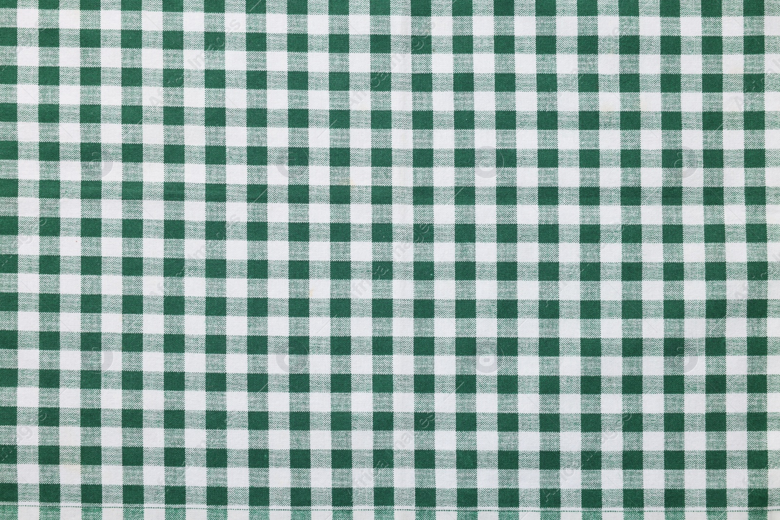 Photo of Texture of checkered fabric as background, top view