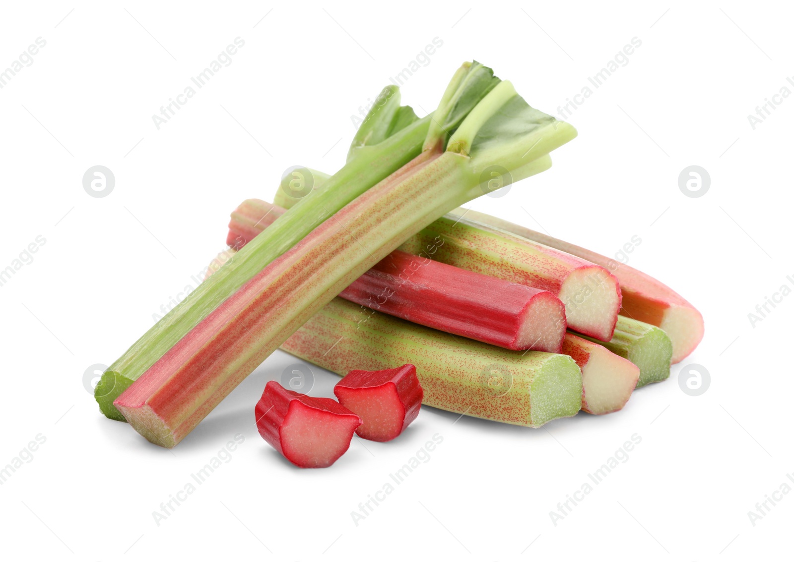 Photo of Cut fresh ripe rhubarb isolated on white