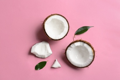 Photo of Flat lay composition with coconuts on color background