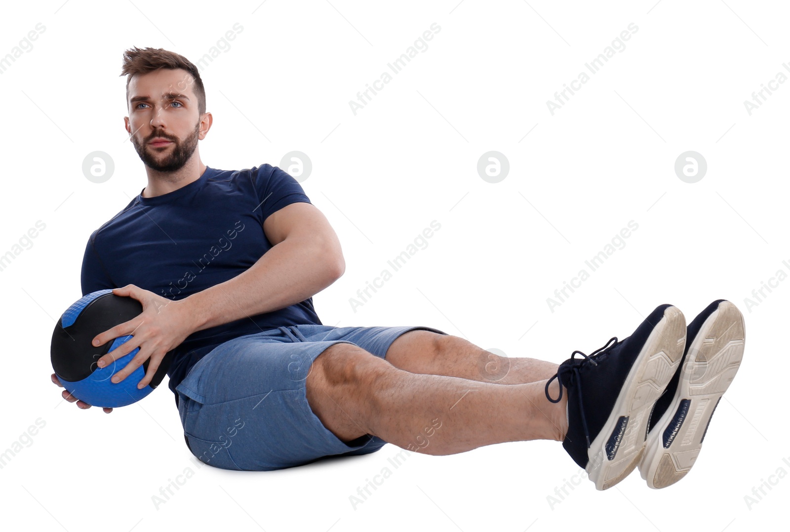 Photo of Athletic man doing exercise with medicine ball isolated on white