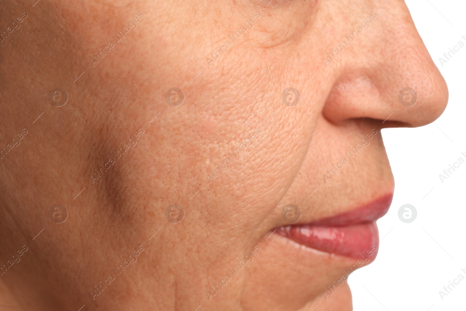 Photo of Closeup view of older woman on white background