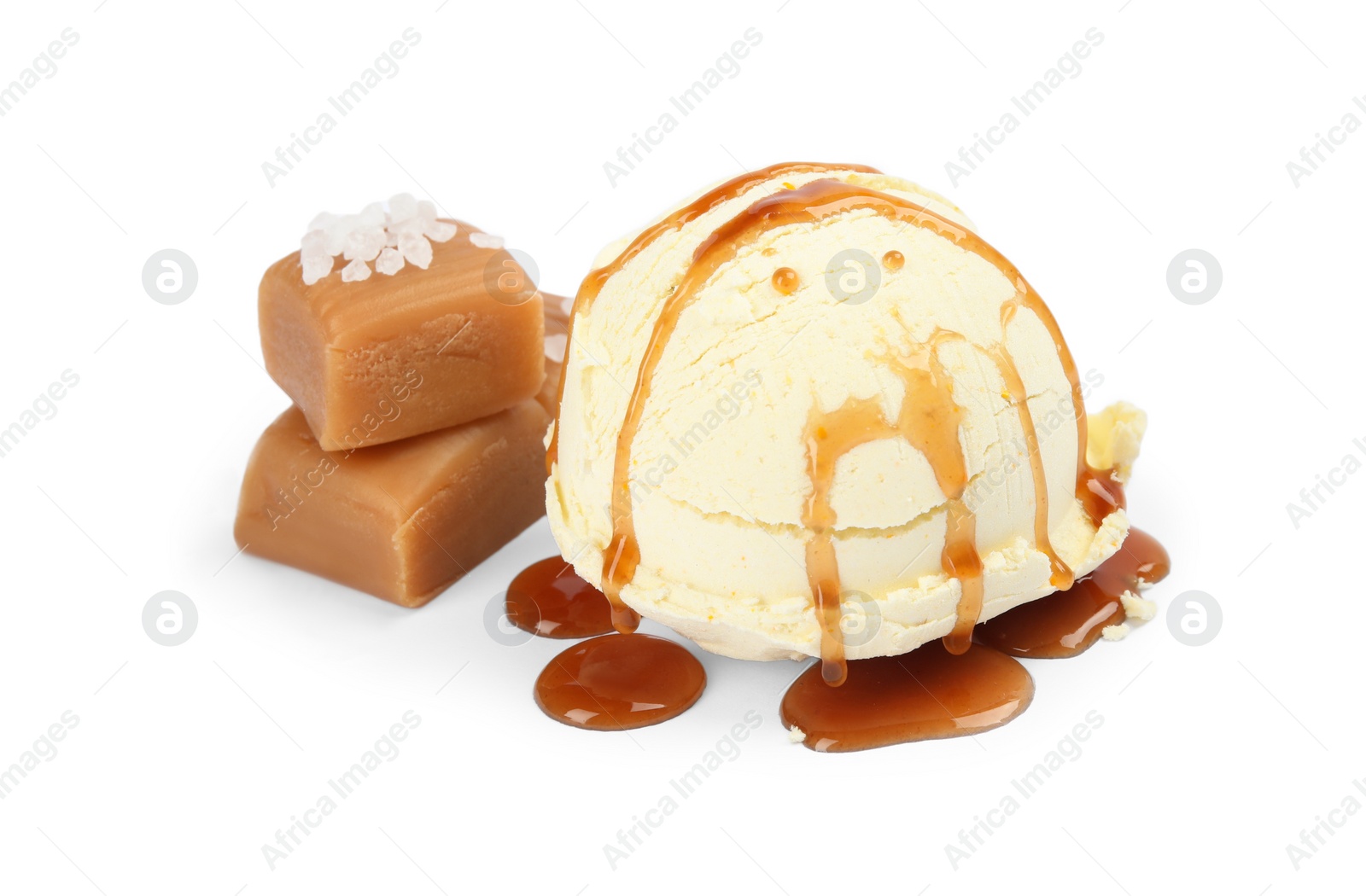 Photo of Delicious ice cream with salted caramel and sauce on white background
