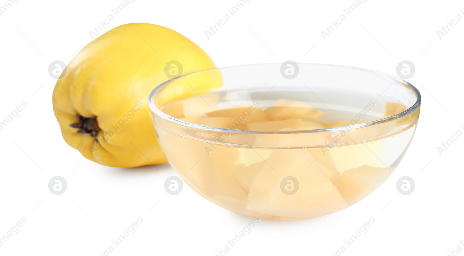 Photo of Delicious quince drink in glass bowl and fresh fruit isolated on white