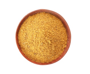 Photo of Bowl with curry powder on white background, top view. Different spices