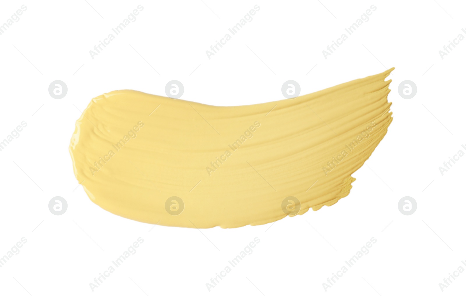 Photo of Stroke of yellow color correcting concealer isolated on white