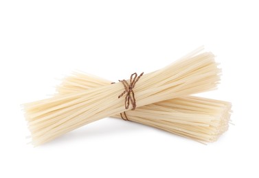 Photo of Bunches of dried rice noodles isolated on white
