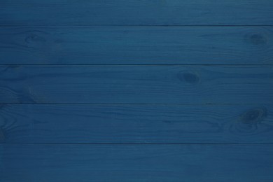 Photo of Texture of blue wooden surface as background, top view