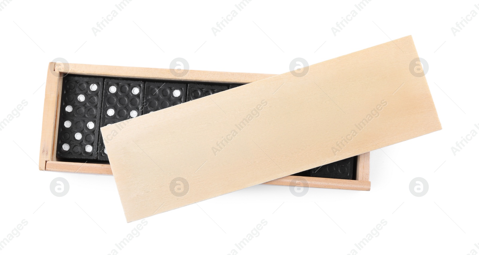 Photo of Wooden box with black domino tiles on white background, top view