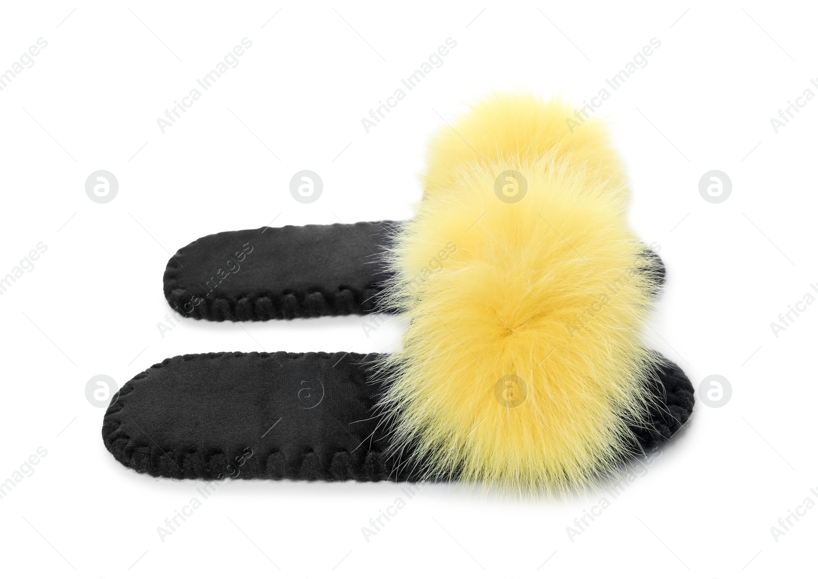 Photo of Pair of fluffy slippers isolated on white