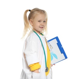 Photo of Cute little child in doctor coat with stethoscope and clipboard on white background