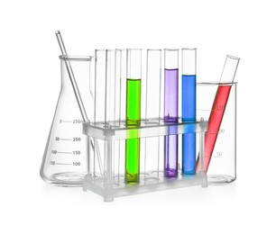 Image of Glass flask, beaker and test tubes with colorful liquids isolated on white
