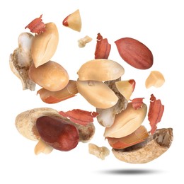 Image of Peanuts and crushed pods in air on white background