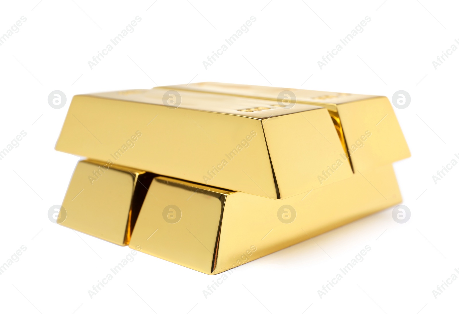 Photo of Precious shiny gold bars on white background