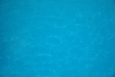 Photo of Surface of swimming pool with clean blue water as background