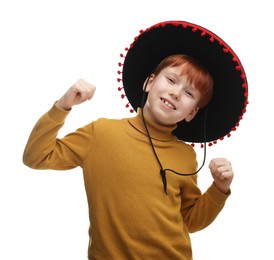 Photo of Cute boy in Mexican sombrero hat dancing on white background