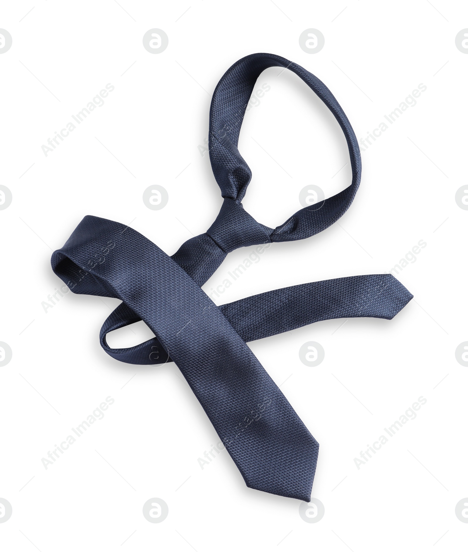 Photo of One blue necktie isolated on white, top view