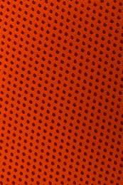 Photo of Texture of orange fabric as background, top view