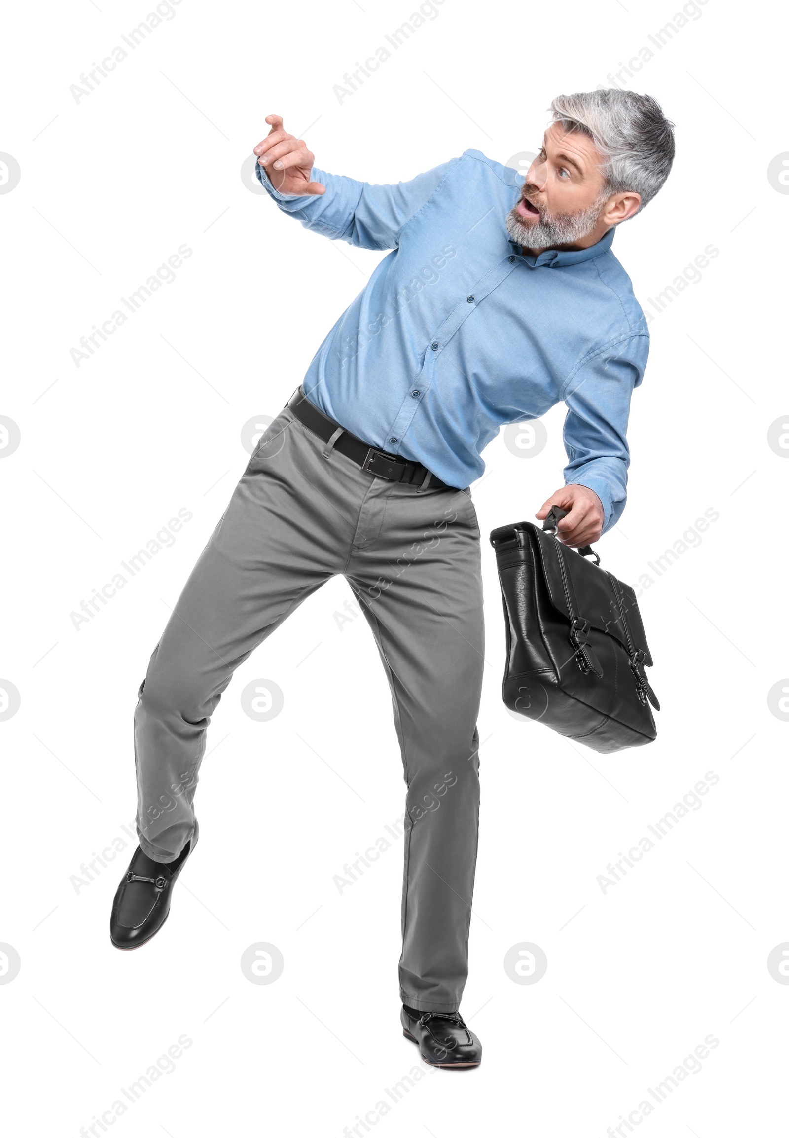 Photo of Mature businessman in stylish clothes with briefcase on white background