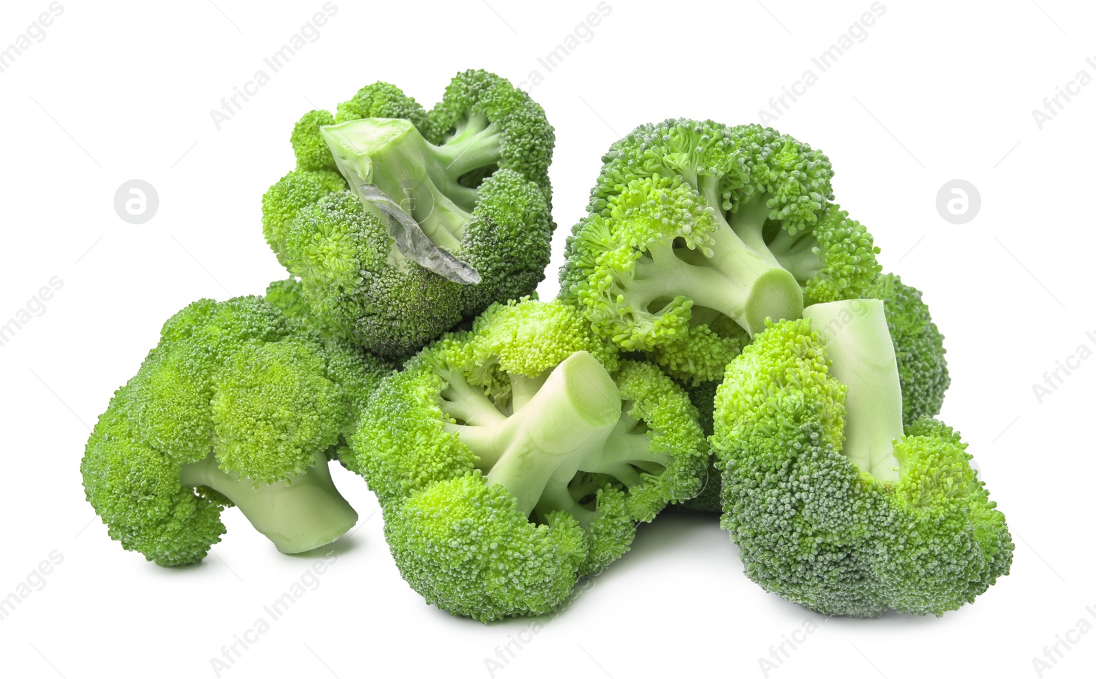 Photo of Pile of fresh raw green broccoli isolated on white